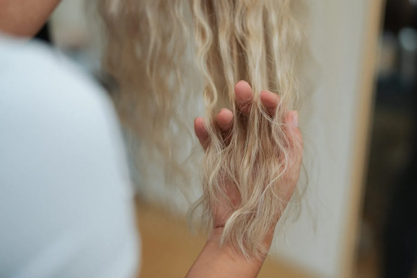 Weft hair extensions, real human hair length applied in studio